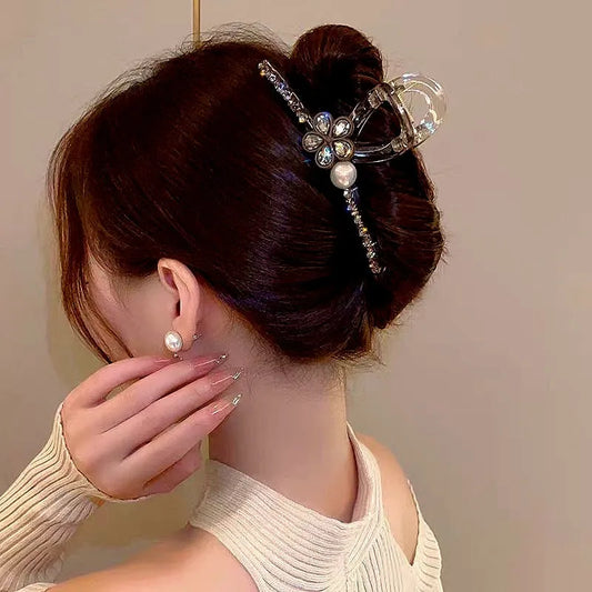 Angled view of the stylish Elegant Rhinestone Flower Hair Clip