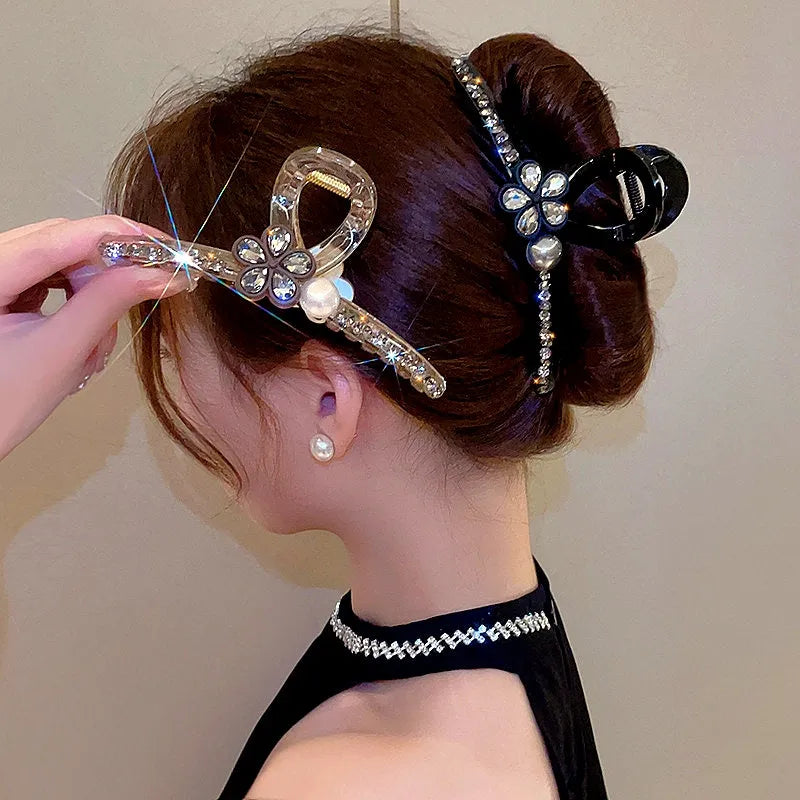 Close-up showing the material and craftsmanship of the Rhinestone Flower Hair Clip