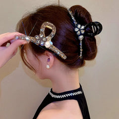 Close-up showing the material and craftsmanship of the Rhinestone Flower Hair Clip
