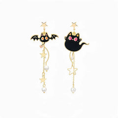 Model showcasing the dangle and style of the Halloween 14K Gold-Plated Bat Asymmetrical Pearl Tassel Earrings