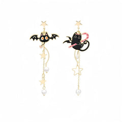 Angled view of the Halloween 14K Gold-Plated Bat Asymmetrical Pearl Tassel Earrings