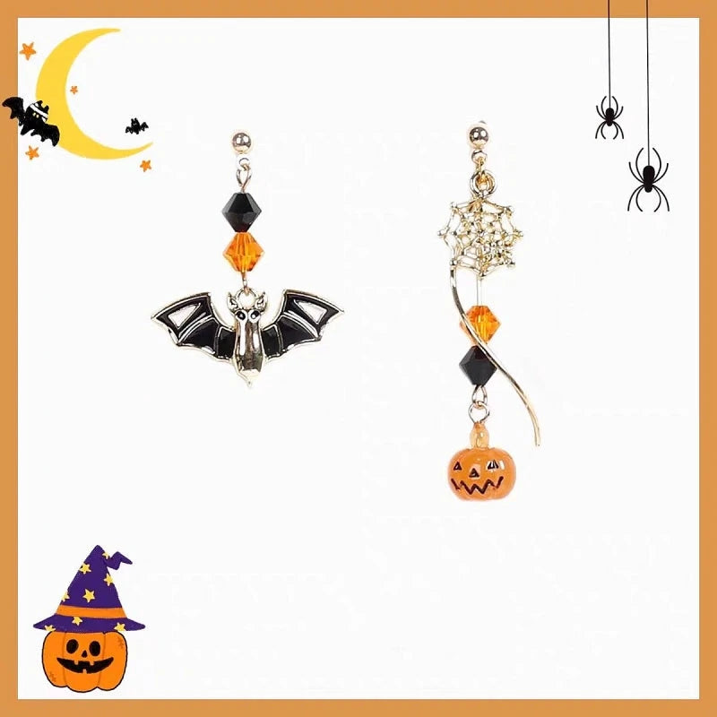 Model showcasing the dangle and style of the Halloween 14K Gold-Plated Pumpkin And Bat Earrings