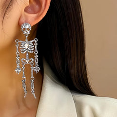 Close-up detail of the sparkling zircons and plating on the Skull Earrings