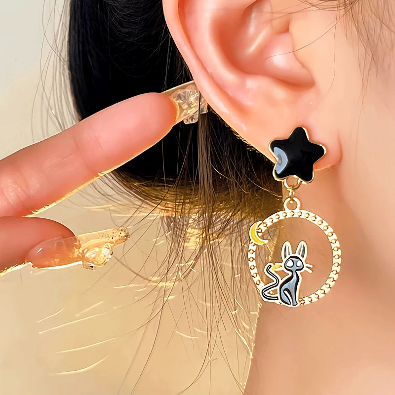 Close-up detail of the sparkling zircons and plating on the Cat Earrings