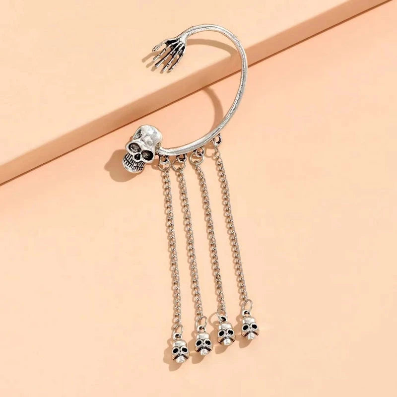 Model showcasing the dangle and style of the Halloween Skull Ear Cuffs (1 Piece)