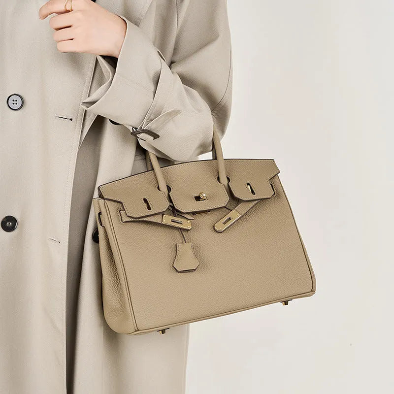 Leather First Layer Cowhide Handbags shown for scale and size reference