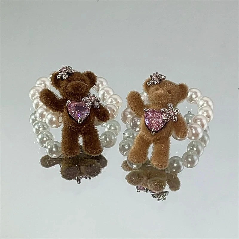 Top-down view of the sparkling Plush Bear Beaded Rings