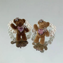 Top-down view of the sparkling Plush Bear Beaded Rings