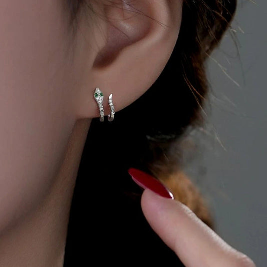 Model showcasing the dangle and style of the Sterling Silver Double-Layer Zircon Diamond Snake Design Stud Earrings