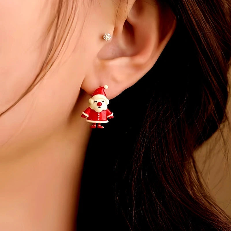 Model showcasing the dangle and style of the Silver Post Christmas Asymmetrical Santa Claus Bell Earrings