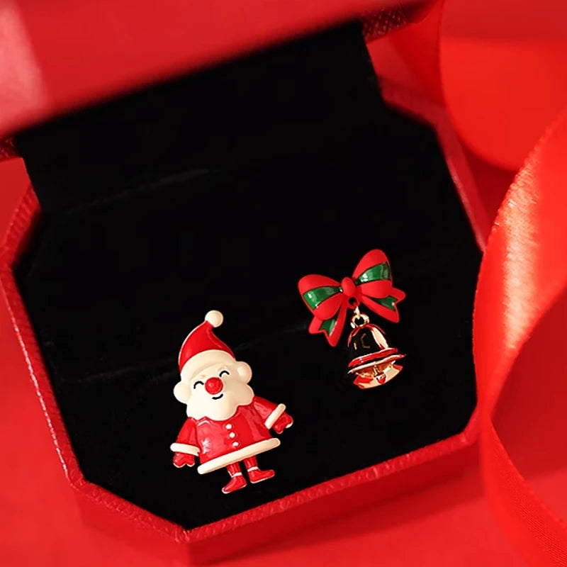 Angled view of the Silver Post Christmas Asymmetrical Santa Claus Bell Earrings
