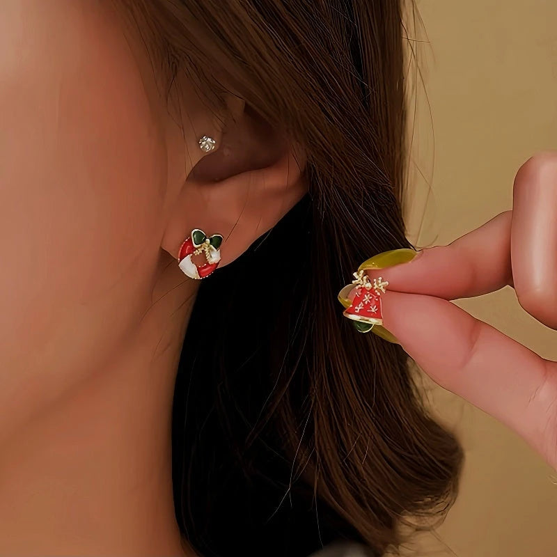 Close-up detail of the sparkling zircons and plating on the Santa Bell Earrings
