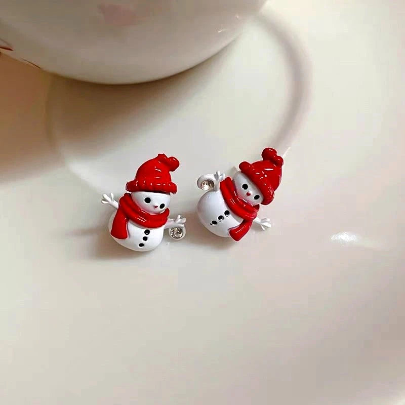 Close-up detail of the sparkling zircons and plating on the Snowman Stud Earrings