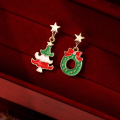 Angled view of the Silver Post Christmas Tree Wreath Asymmetrical Earrings