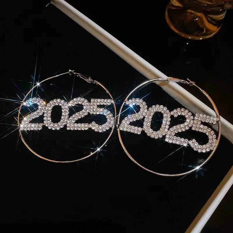 Close-up detail of the sparkling zircons and plating on the New Year Hoops