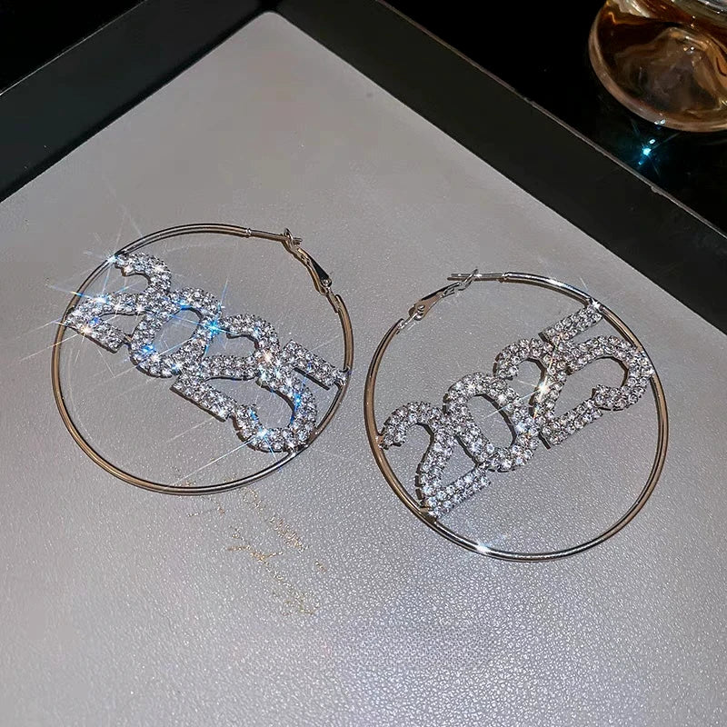 Angled view of the Silver Post Diamond 2025 New Year Hoop Earrings