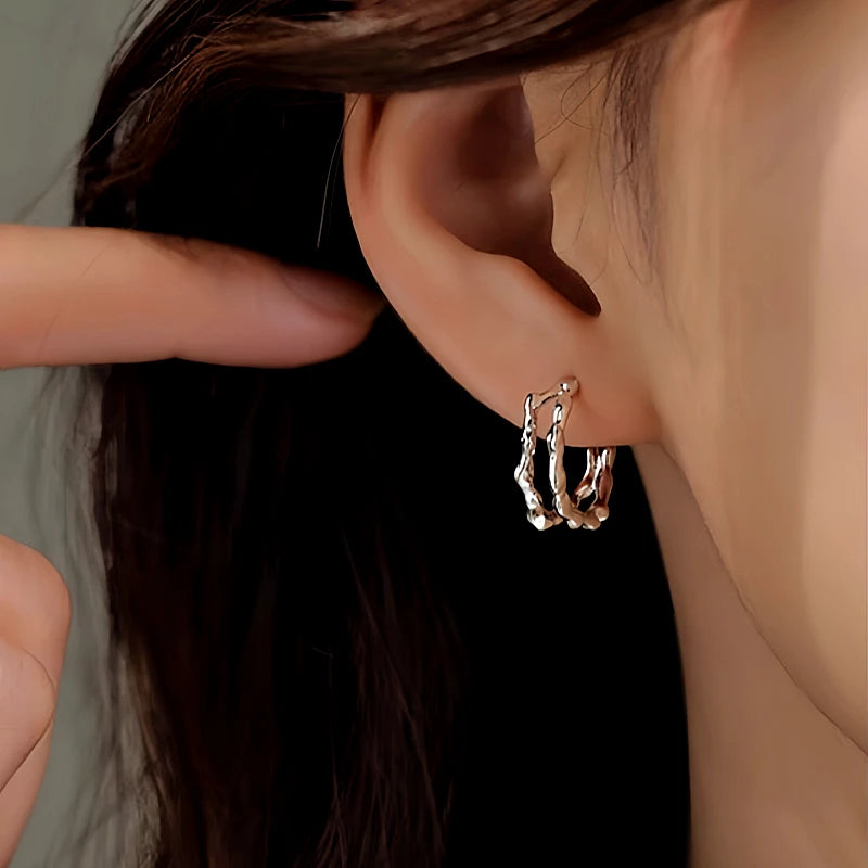 Angled view of the Silver Post Double-Layer Plain Hoop Earrings