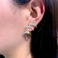 Close-up detail of the sparkling zircons and plating on the Rhinestone Butterfly Studs