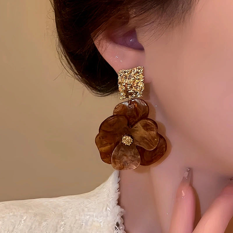 Close-up detail of the sparkling zircons and plating on the Flower Hoop Earrings