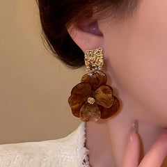 Close-up detail of the sparkling zircons and plating on the Flower Hoop Earrings