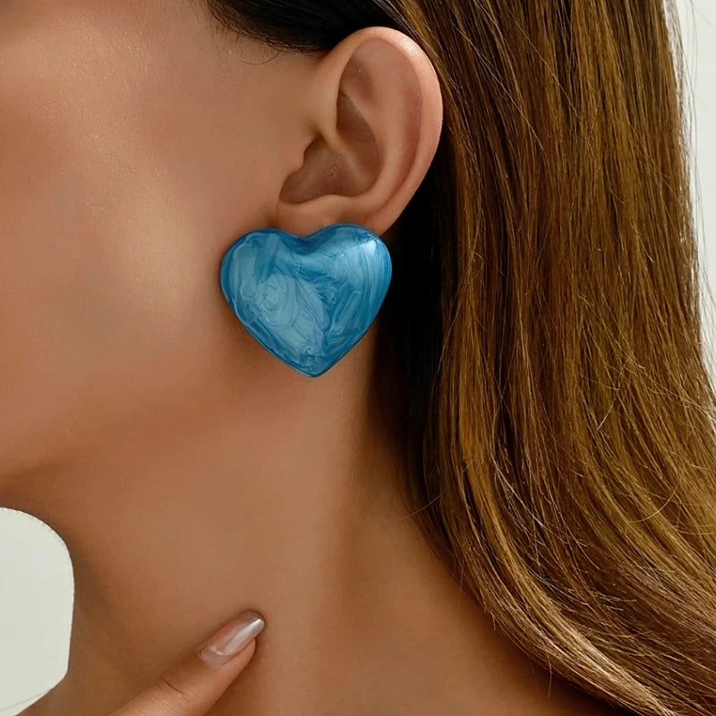 Detailed view of the sparkling accents on the Painted Heart Studs