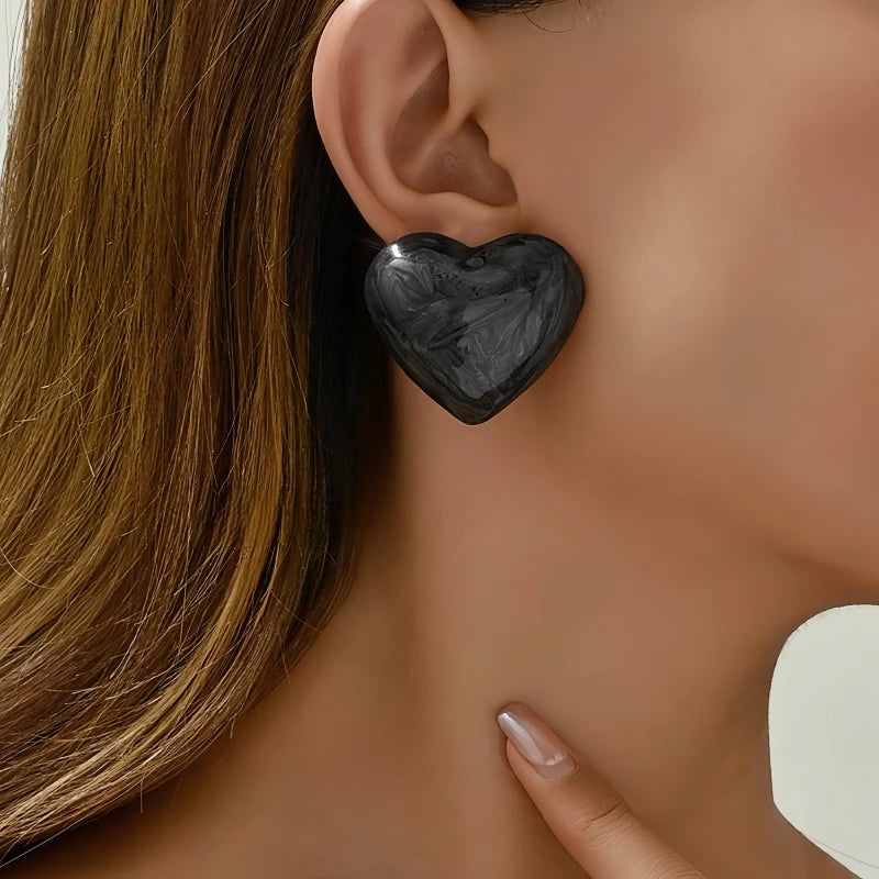 Full view of the elegant and stylish Painted Heart Studs