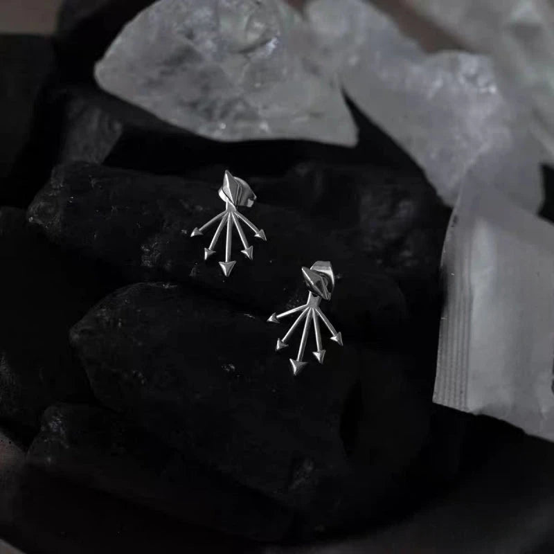 Close-up detail of the sparkling zircons and plating on the Rivet Jacket Earrings