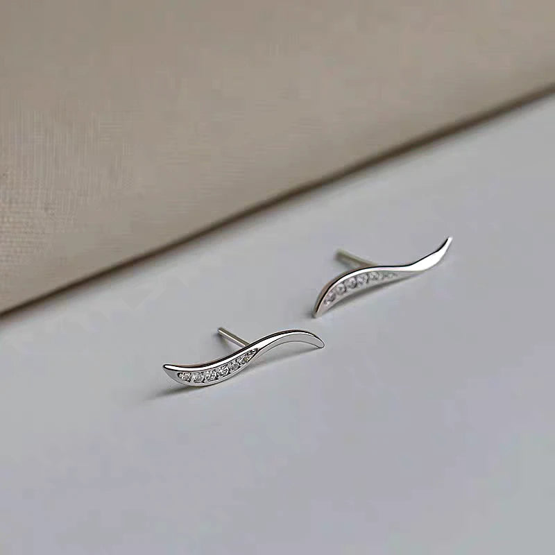Close-up detail of the sparkling zircons and plating on the Zircon Arc Studs