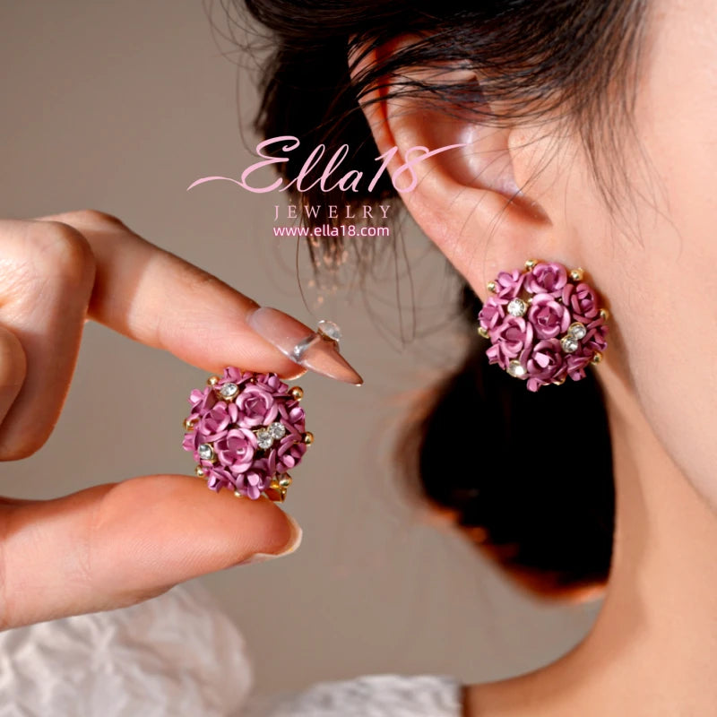 Model showcasing the dangle and style of the Silver Post Zircon Diamond Flower Stud Earrings