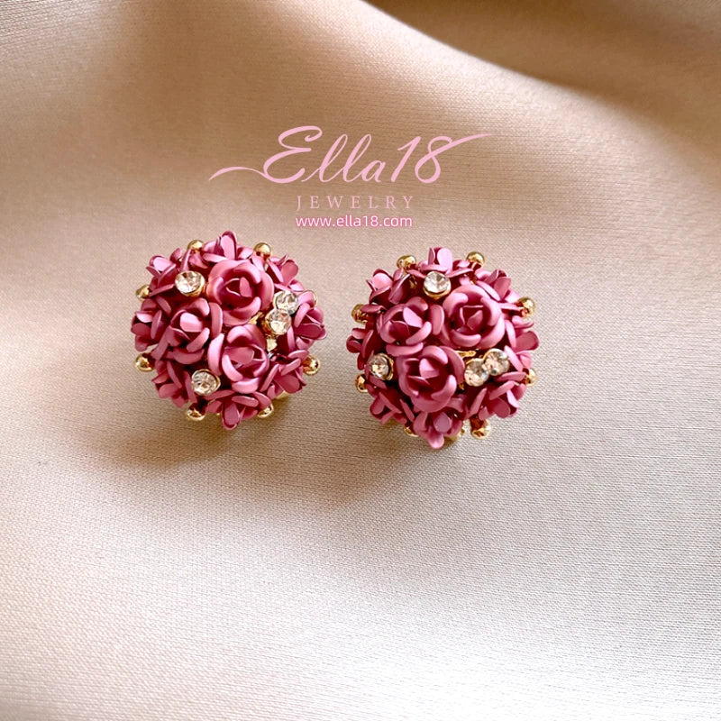 Close-up detail of the sparkling zircons and plating on the Flower Stud Earrings