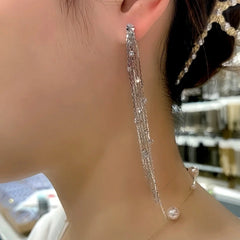 Close-up detail of the sparkling zircons and plating on the Zircon Tassel Earrings