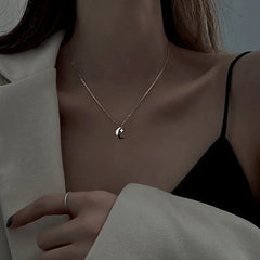 Sterling Silve Star And Moon Necklace worn to showcase its length and pendant detail