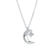 Close-up of the pendant and clasp on the Star and Moon Necklace