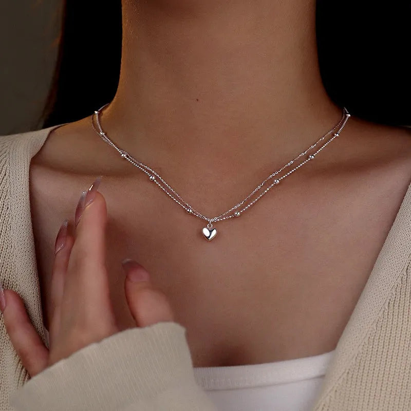 Sterling Silver 2025 Double-Layer Love Heart Necklace worn to showcase its length and pendant detail