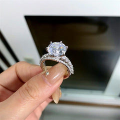 Close-up view of the gemstone and setting of the 5 Carat Moissanite