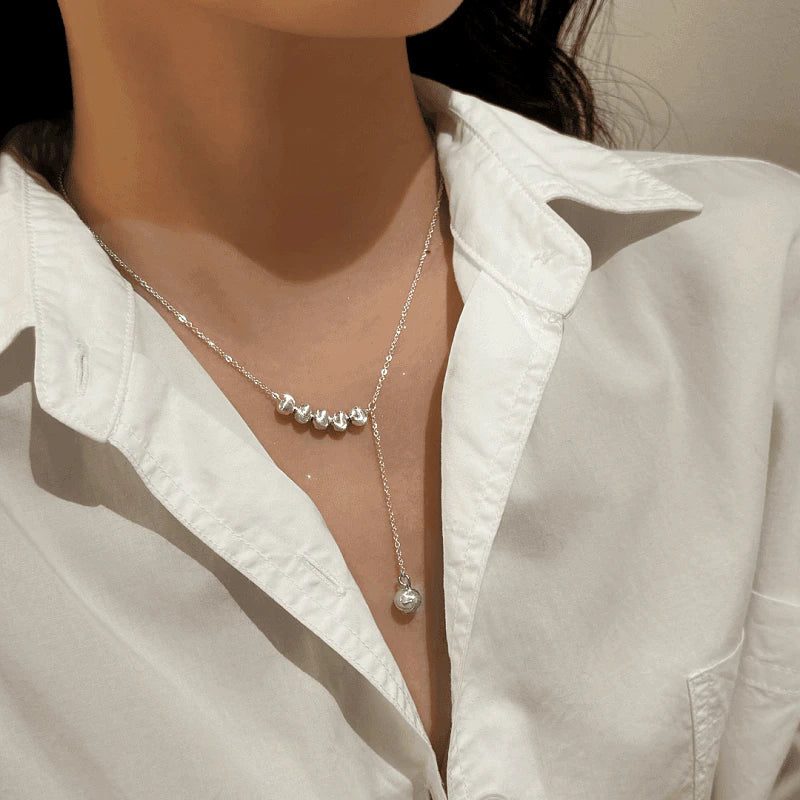 Sterling Silver Adjustable Beads Tassel Necklace worn to showcase its length and pendant detail