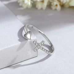 Top-down view of the sparkling Sterling Silver Adjustable Cross Love Heart Rings