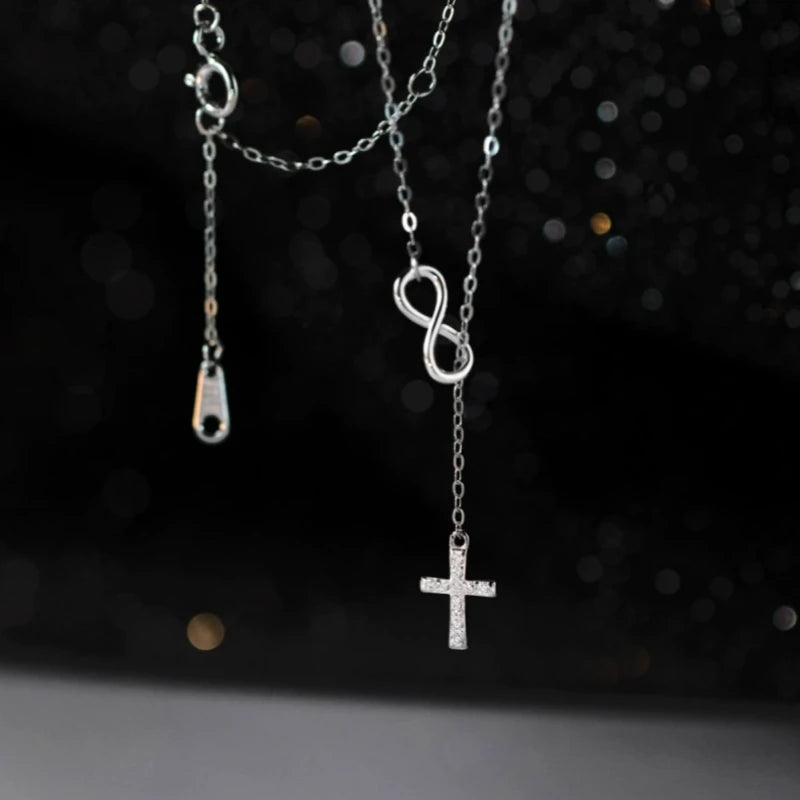 Close-up of the pendant and clasp on the Diamond Cross Necklace