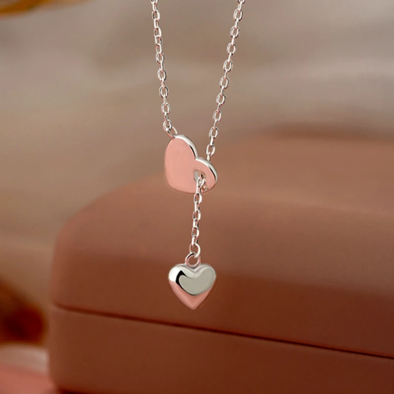 Sterling Silver Adjustable Heart Necklace worn to showcase its length and pendant detail