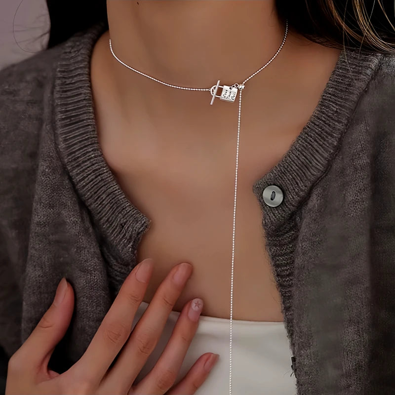 Close-up of the pendant and clasp on the Lock Heart Tassel