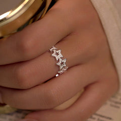 Close-up view of the gemstone and setting of the Adjustable Star Ring