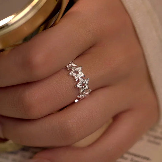 Sterling Silver Adjustable Star Rings worn on the hand to show its beautiful fit and design