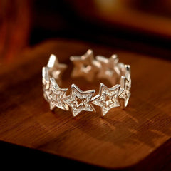 Top-down view of the sparkling Sterling Silver Adjustable Star Rings