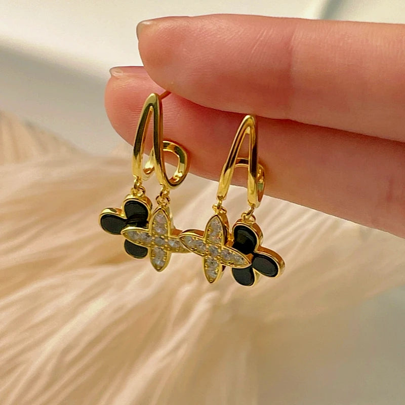 Angled view of the Sterling Silver Agate Four-Leaf Clover Earrings