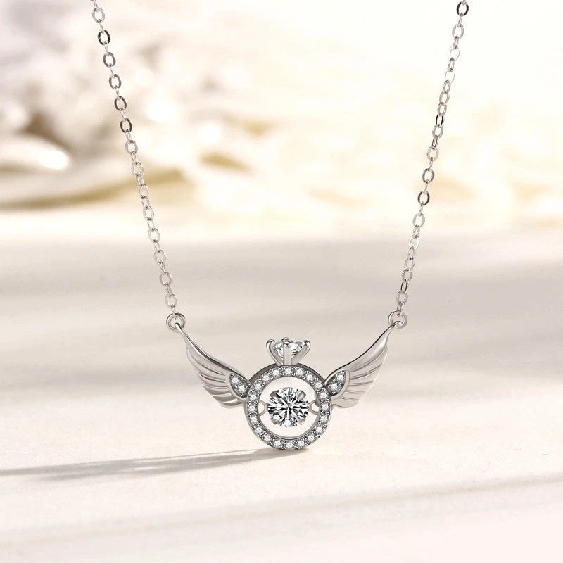 Close-up of the pendant and clasp on the Angel Wings Necklace