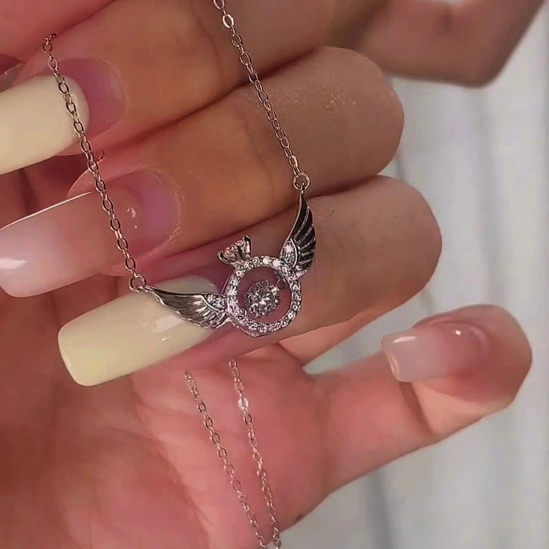 Detailed view of the Sterling Silver Angel Wings Necklace chain and pendant