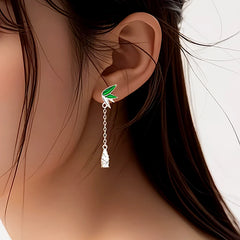 Model showcasing the dangle and style of the Sterling Silver Bamboo Shoots Tassel Earrings