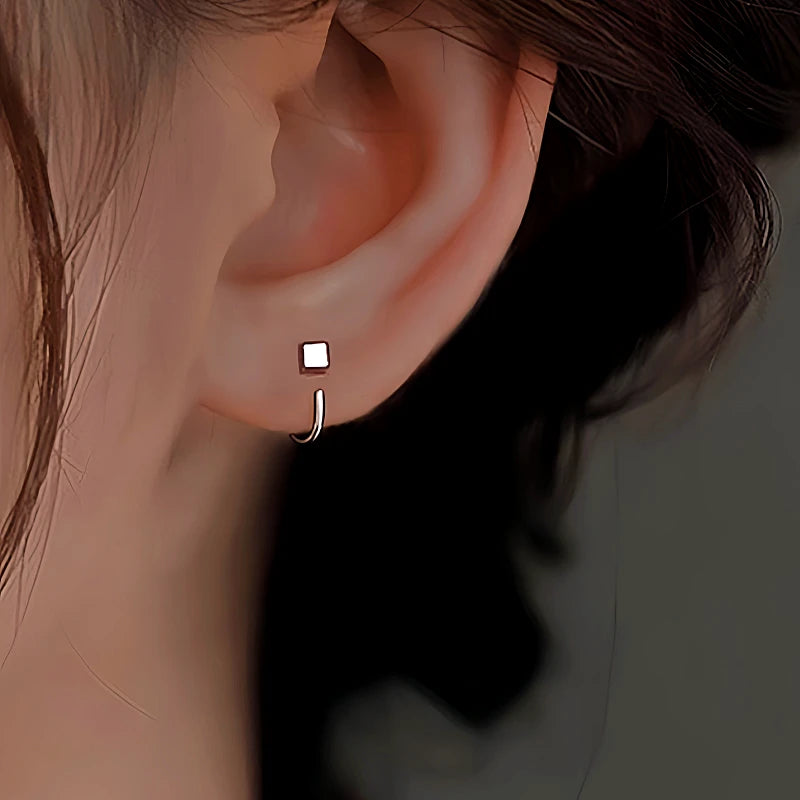 Angled view of the Sterling Silver Bean Ear Hook  Earrings