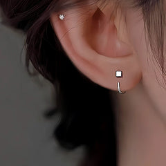 Model showcasing the dangle and style of the Sterling Silver Bean Ear Hook  Earrings