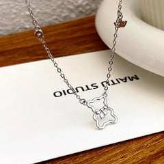 Close-up of the pendant and clasp on the Dainty Bear Necklace